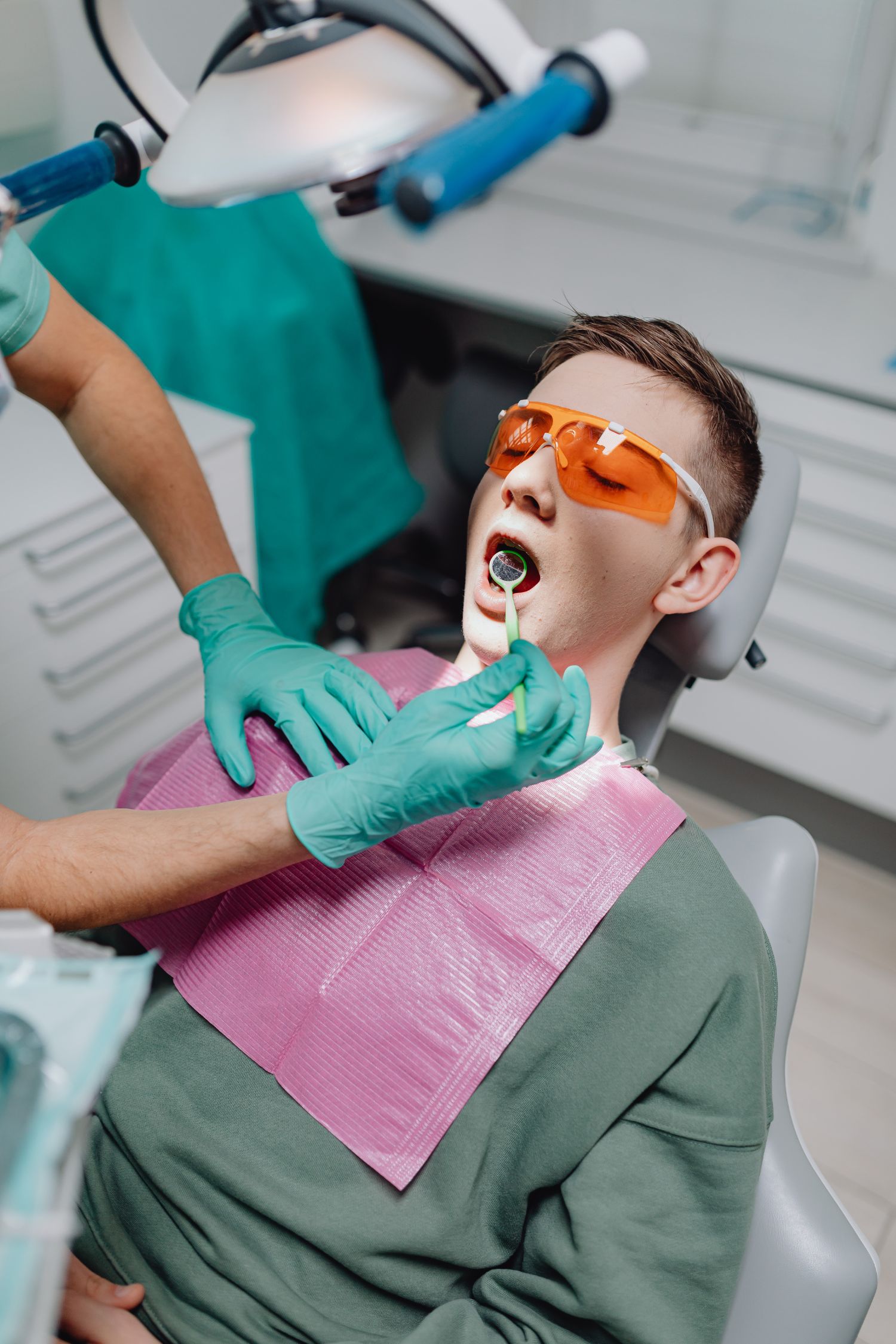 Patient receiving dental treatment in a modern clinic